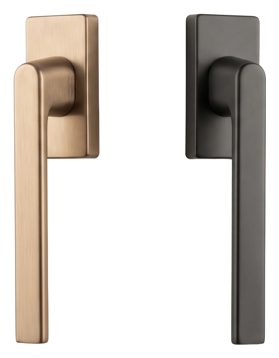 Two slim tilt-and-turn window handles in champagne bronze and matte anthracite (AI-generated)